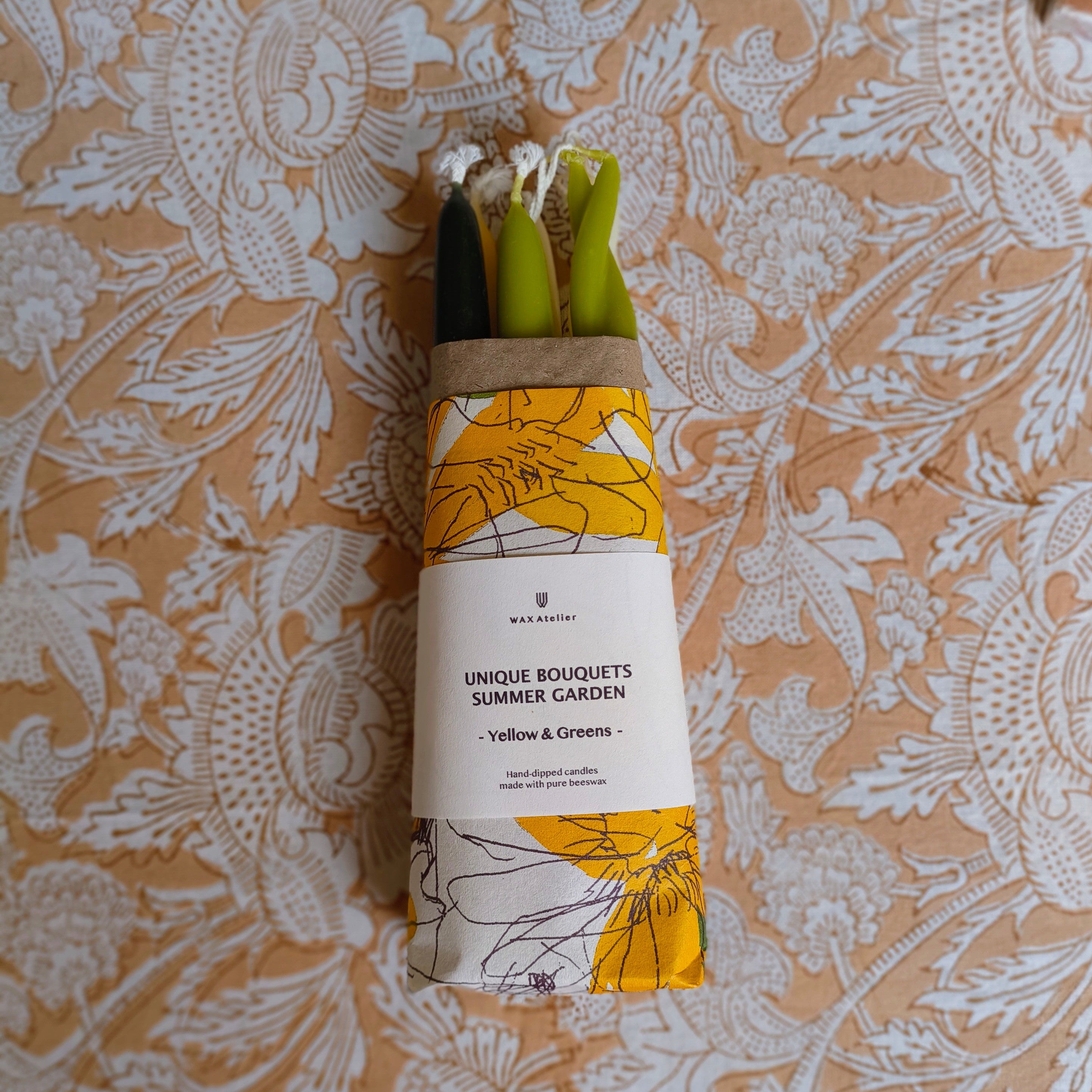 6 pack of yellow and green candles