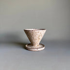 Ceramic filter on a gray background