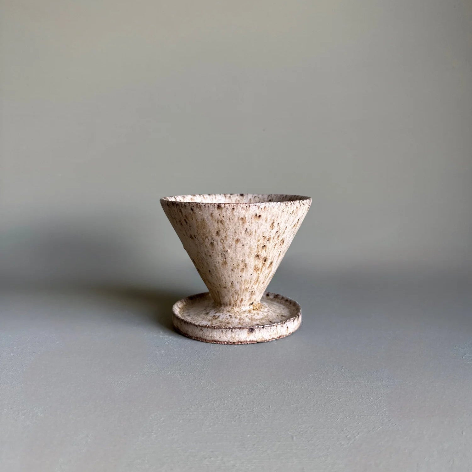 Ceramic filter on a gray background