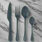 Blue enamel cutlery set edged with green