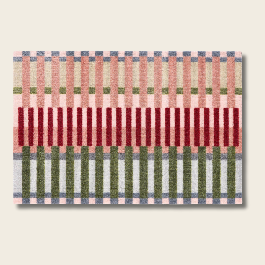 Rectangular woven rug with striped pattern on a beige background