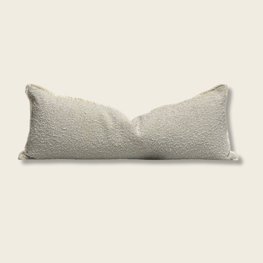Textured rectangular pillow on a white background