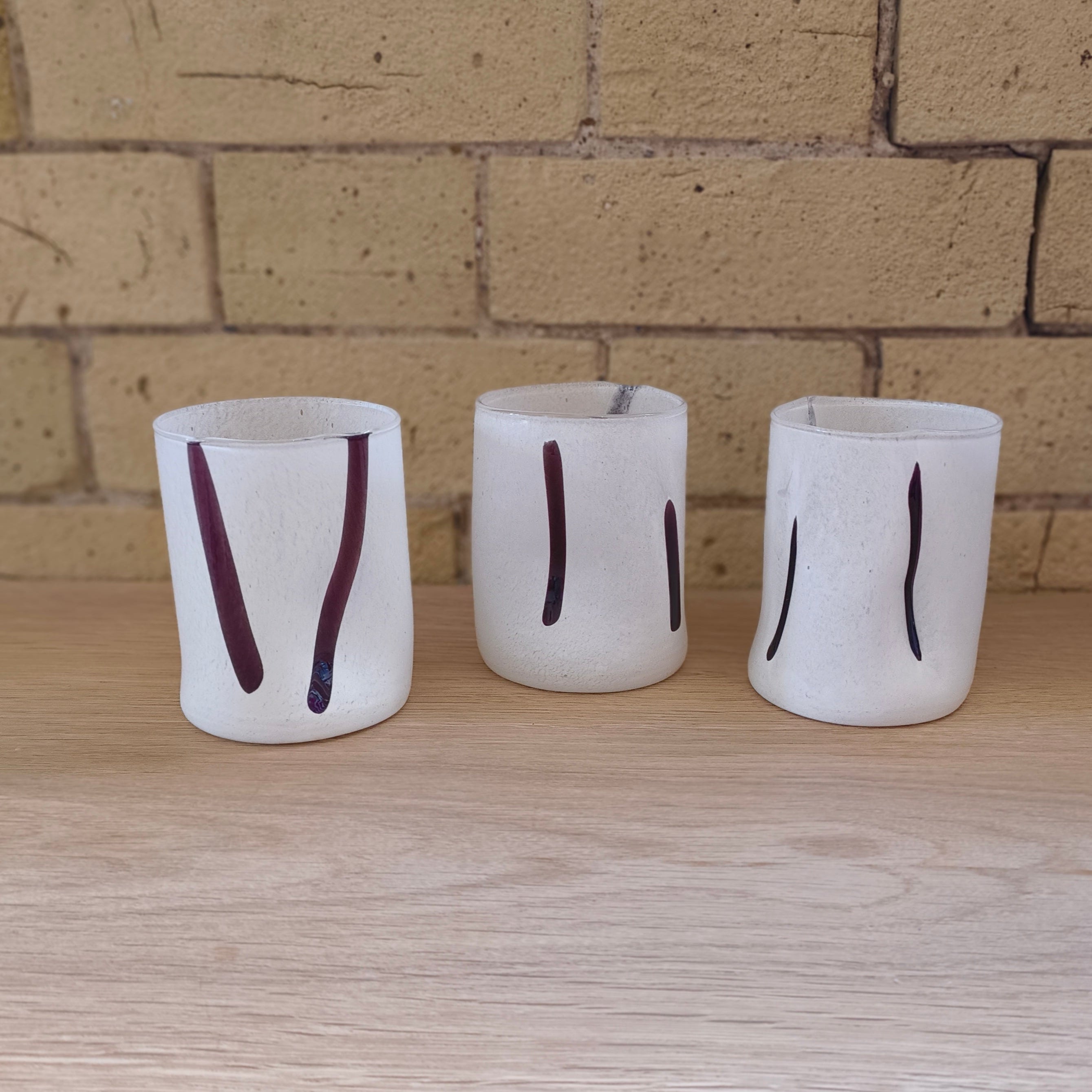 Handblown glass tumbler in white and amethyst