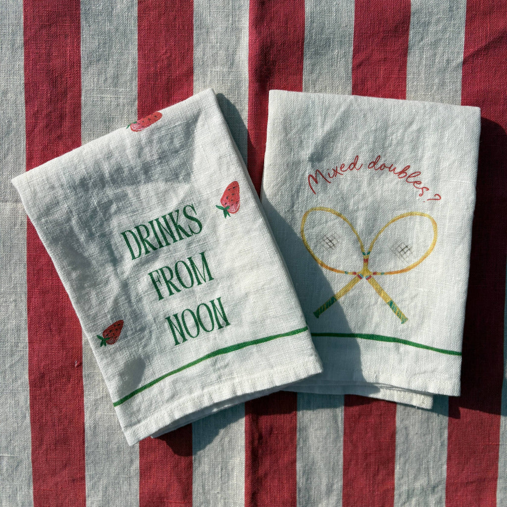 set of napkins, mixed doubles and drinks from noon