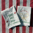 set of napkins, mixed doubles and drinks from noon