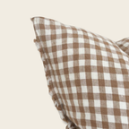 gingham cushion cover detail in brown and cream 