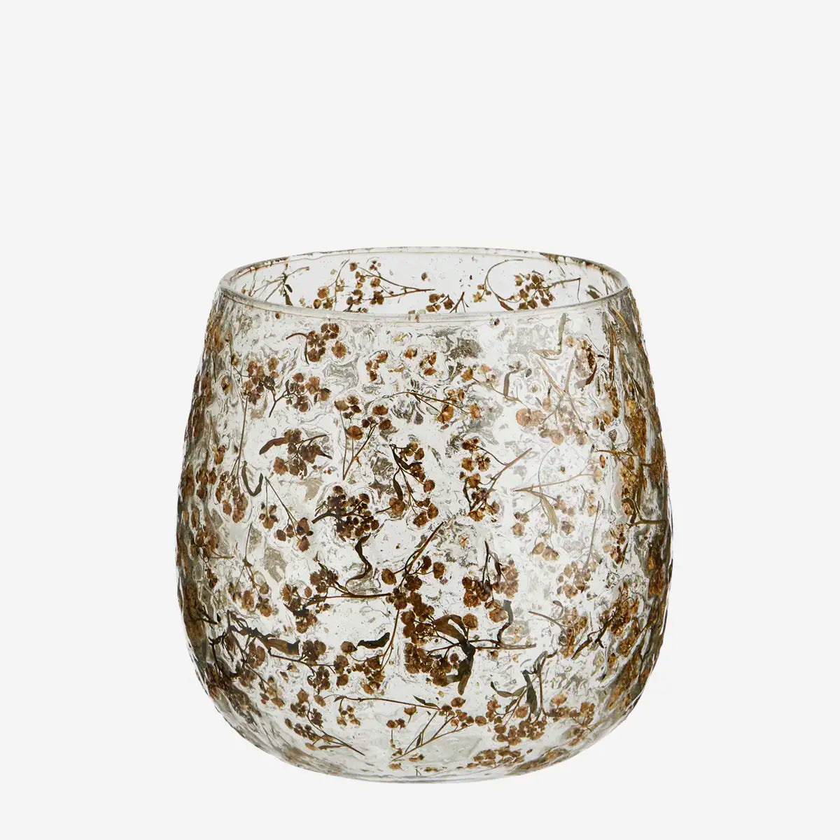 Clear glass vase with leaves inside the glass.