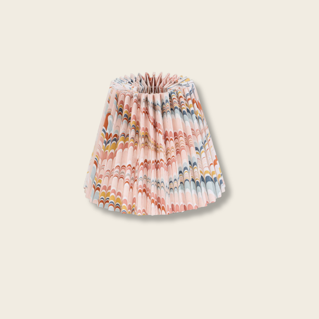 hand marbled pink pleated lamp shade on beige background