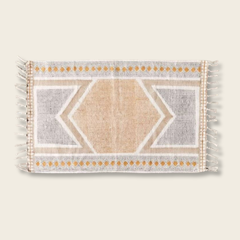 Decorative rug with geometric pattern and tassels on a beige background