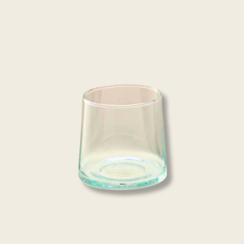 Low glass on a beige brackground