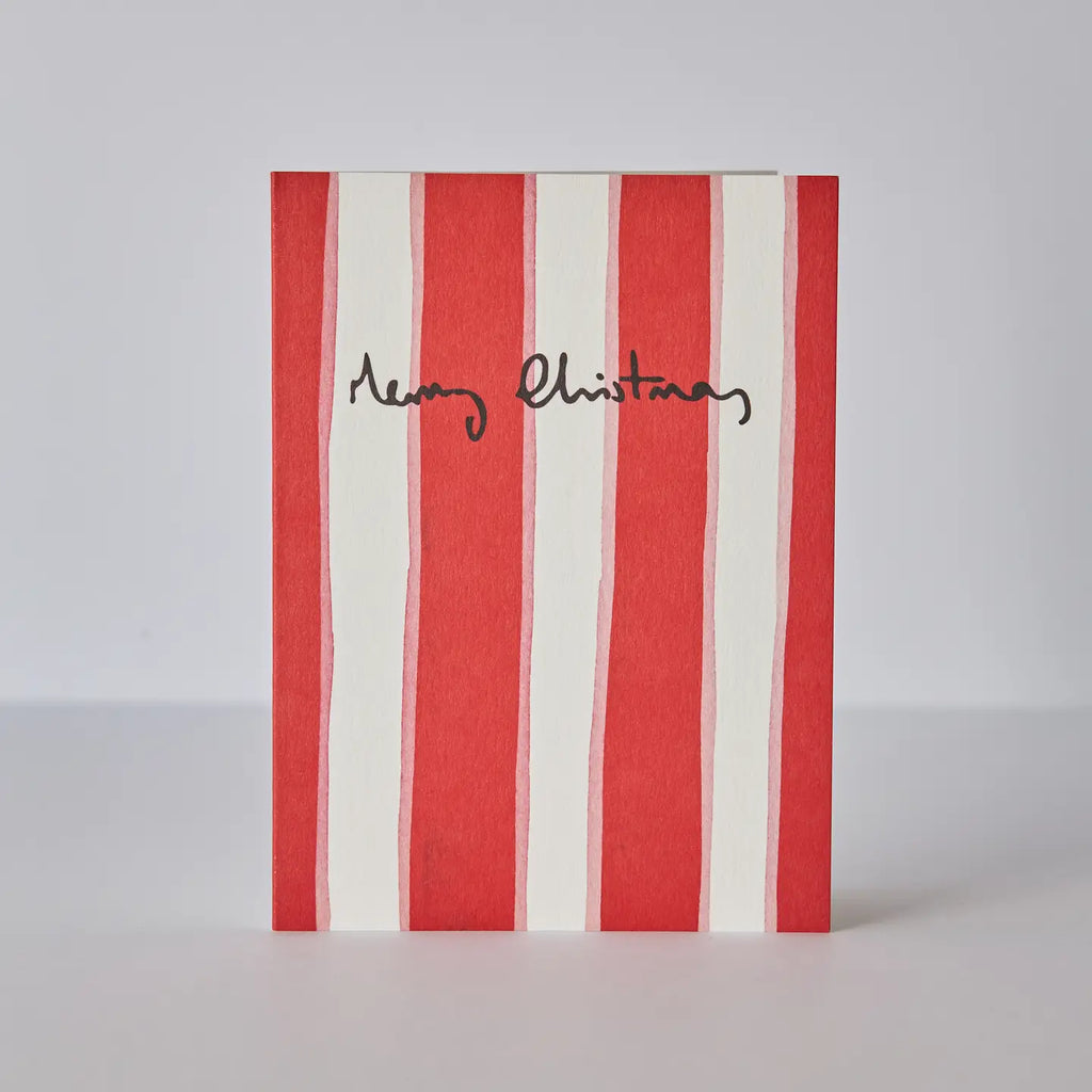 red and pink stripe card with merry Christmas slogan.