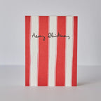 red and pink stripe card with merry Christmas slogan.