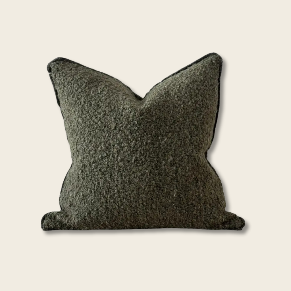Olive textured Cushion on a beige background