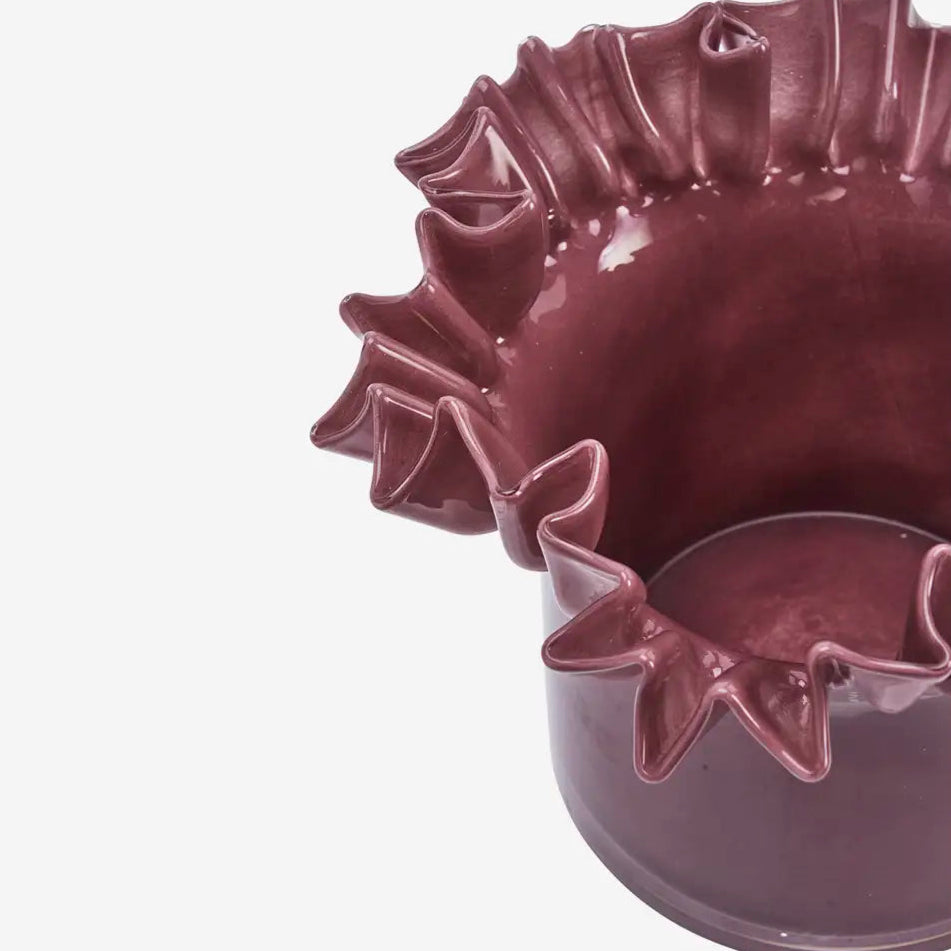 Plum Glass Pot with decorative edge on a white background