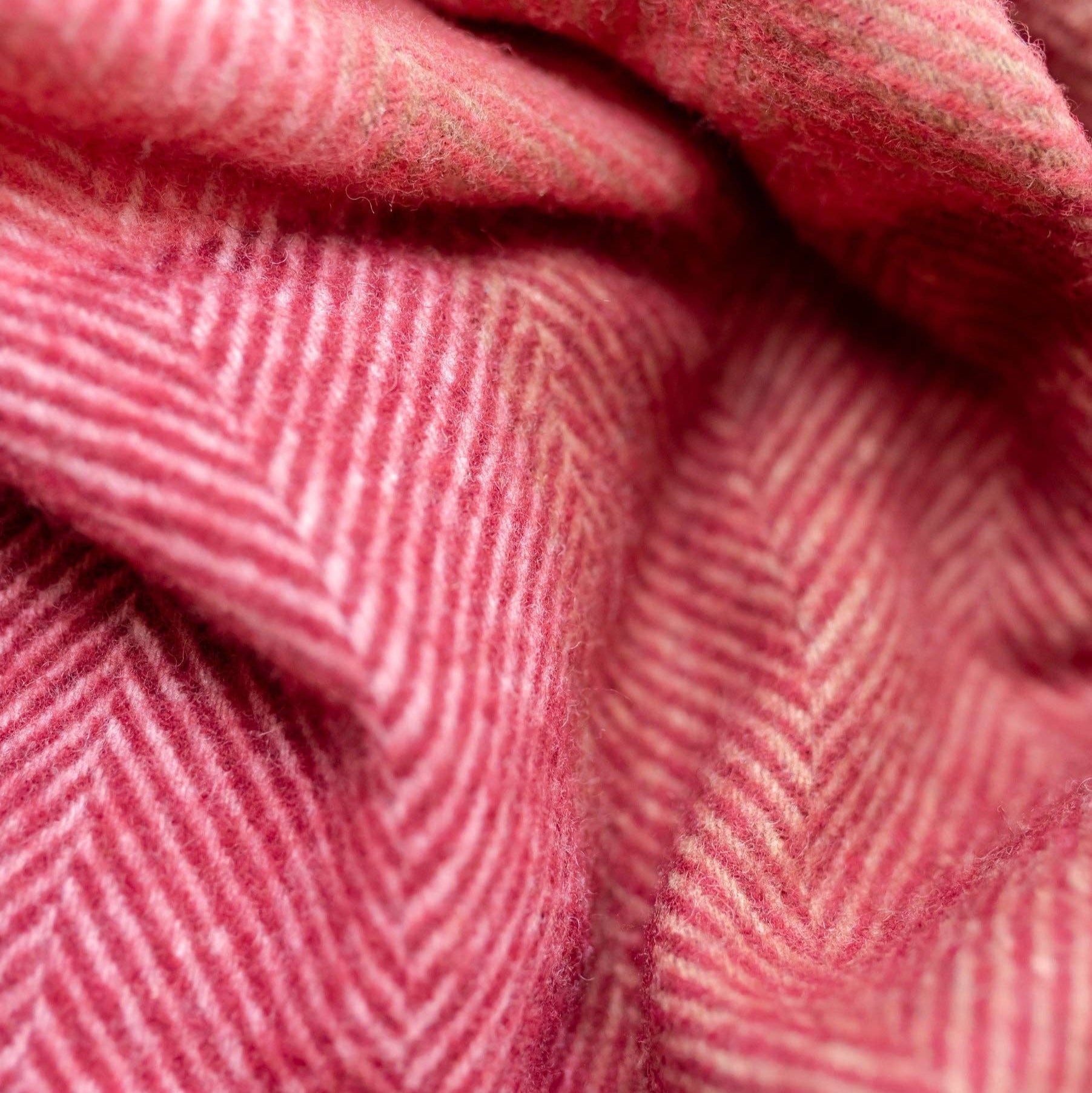 Red and pink recycled wool throw
