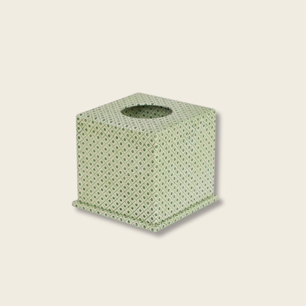 Green textured tissue box on a beige background