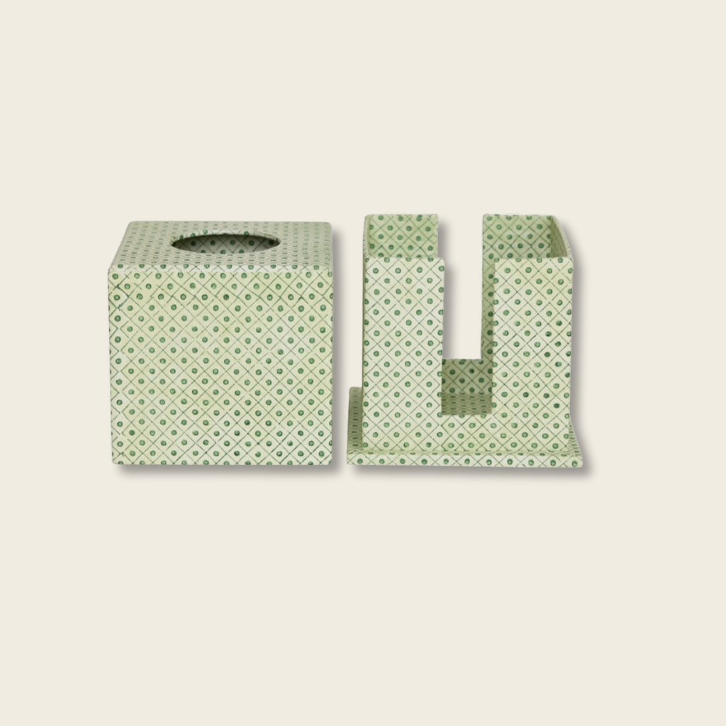Green patterned tissue box cover and holder on a beige background