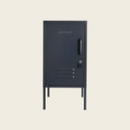 Black metal locker with 'Mustard' branding on a beige background