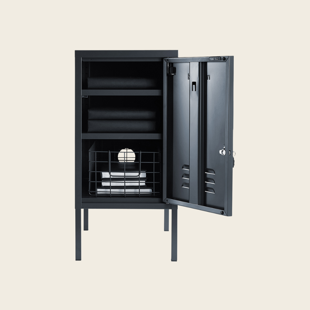 Slate metal locker with open door on a beige background