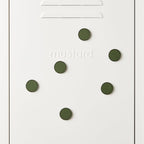 White door with green circular magnets and 'mustard' text