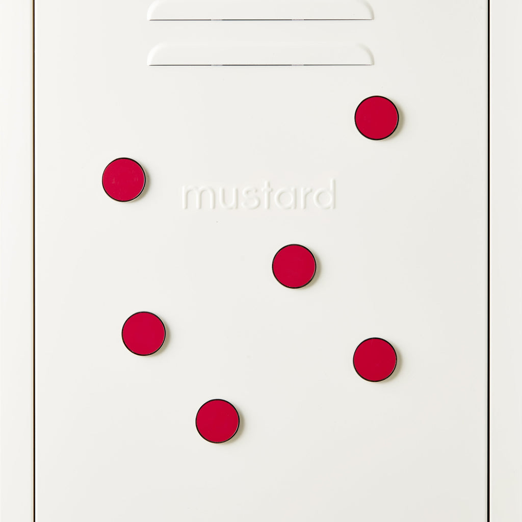 White door with red circular magnets and 'mustard' branding.