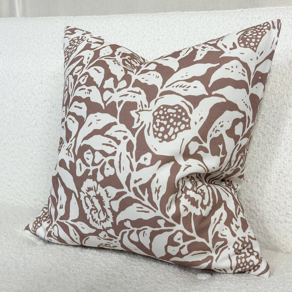 Brown and white floral print cushion