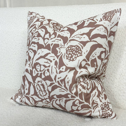 Brown and white floral print cushion