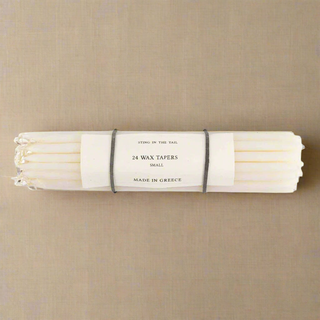 24 Small wax tapered candles