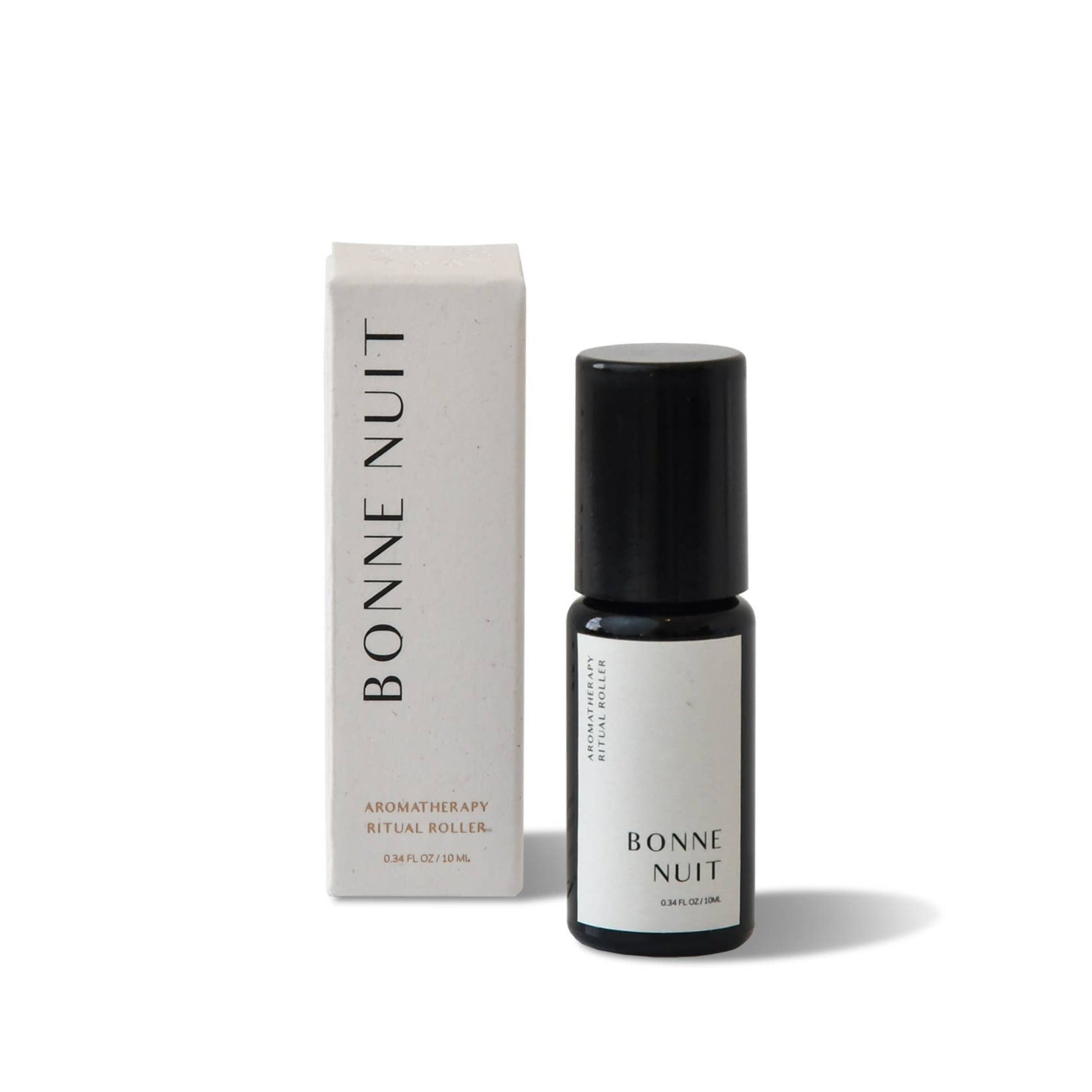 Bottle and box of 'Bonne Nuit' aromatherapy roller on a white background