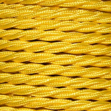 Close-up of yellow braided rope on a light gray background