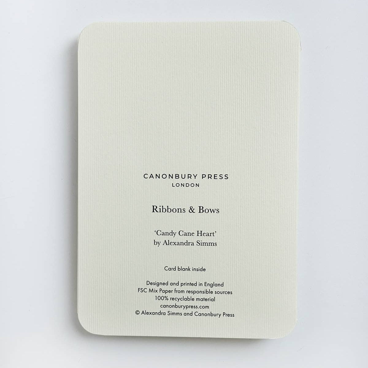Back of a card with 'Canonbury Press London' branding and product details on a light gray background