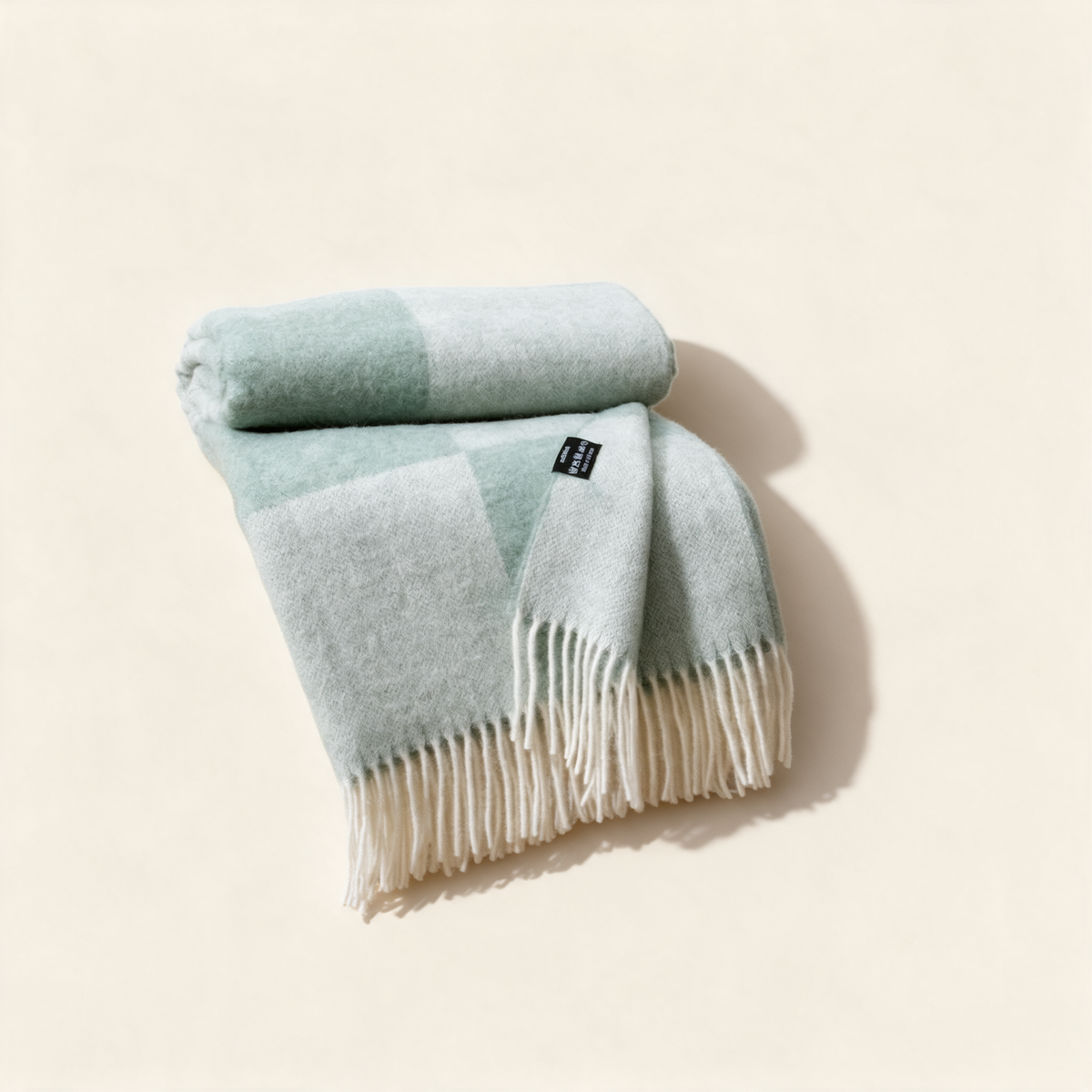 Green checkerboard pure wool blanket, folded