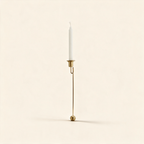 Christmas tree shaped candle holder in antique brass on a warm cream background