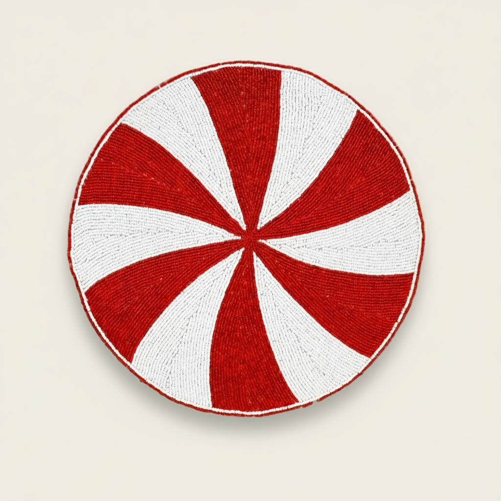 Round red and white striped coaster on a white background