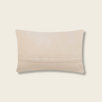 Beige pillow on a beige background