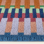 Striped coir door mat, close-up detail