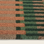 close up of a coir stripe door mat