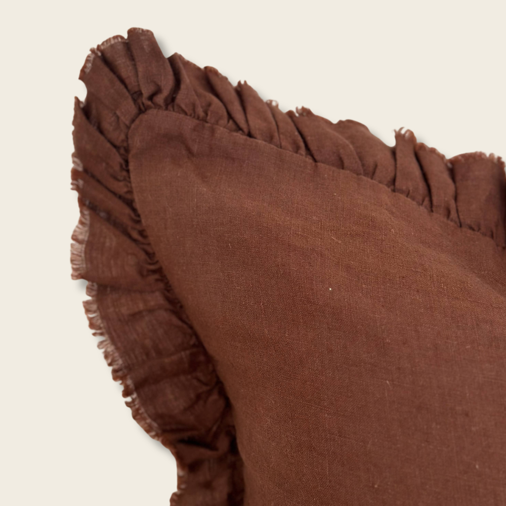 detail edge of a brown ruffle cushion cover