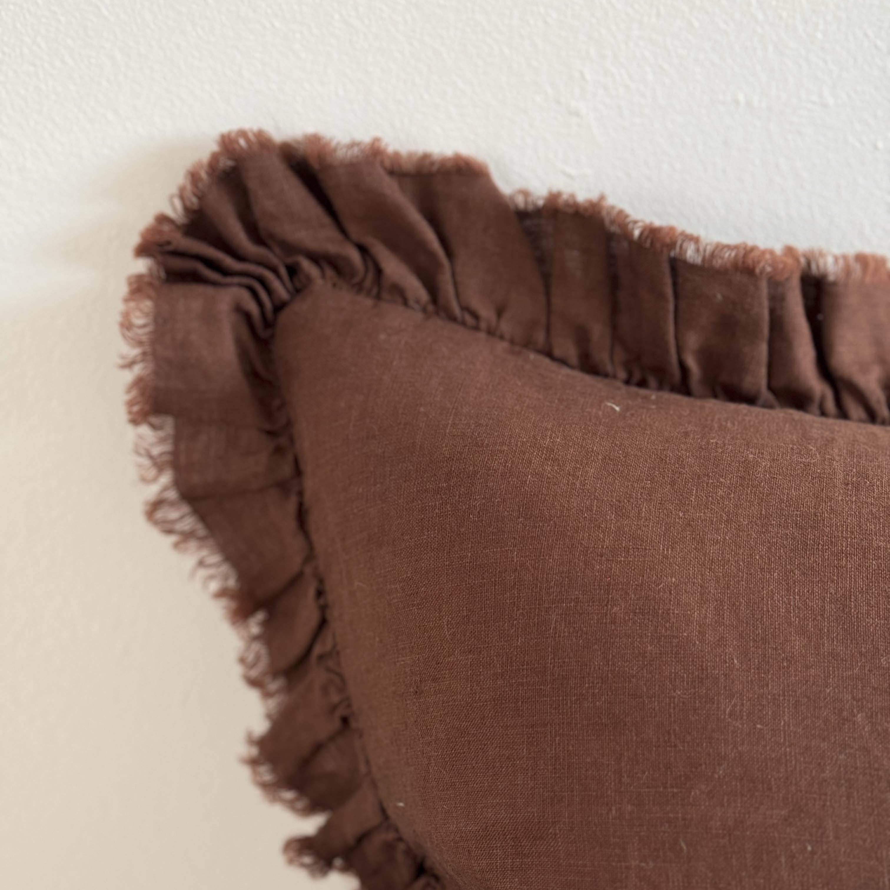 Edge of cushion with frayed edges