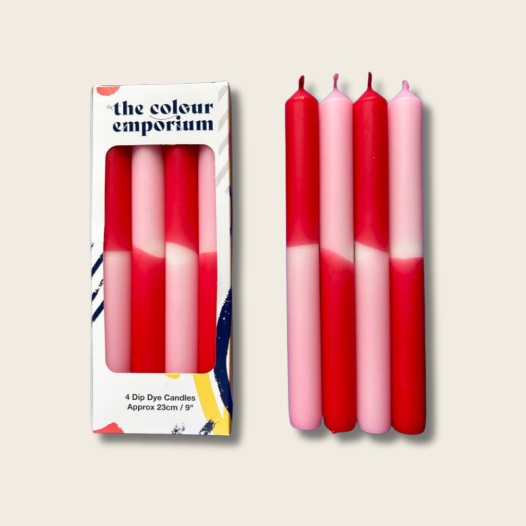 Set of dip-dye candles with a 'the colour emporium' packaging on a beige background