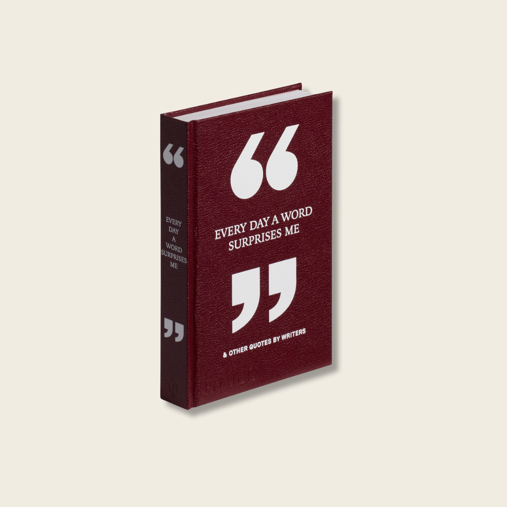 Book with a maroon cover and white text on a beige background