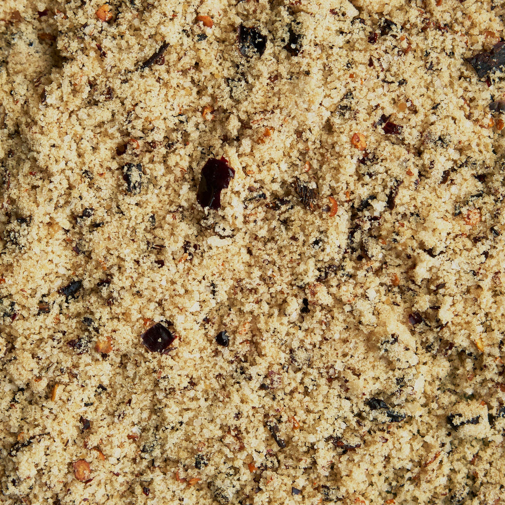 Close-up of sand with small rocks and pebbles