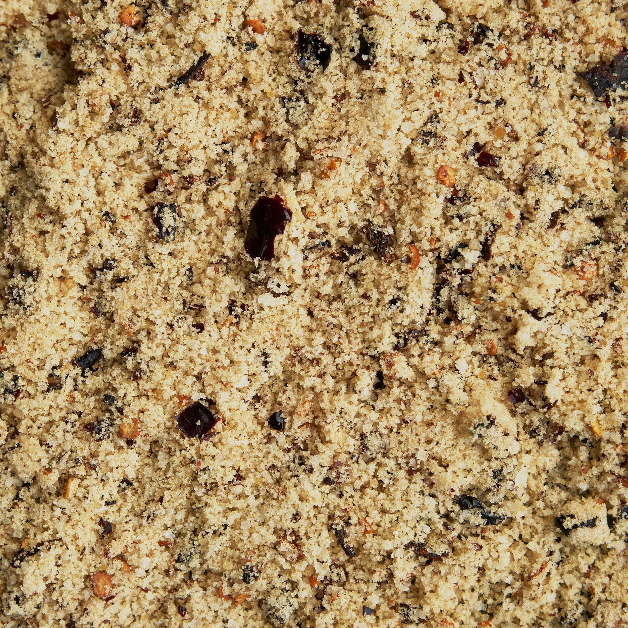 Close-up of sand with small rocks and pebbles