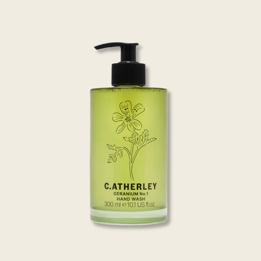 Catherley hand wash bottle with floral design on a beige background