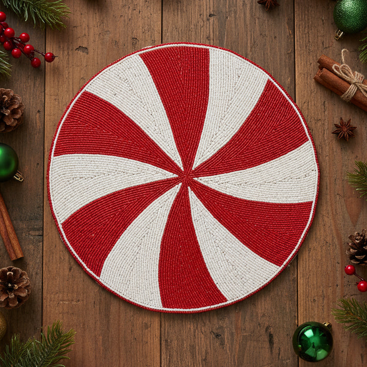 Round red and white striped coaster on a white background