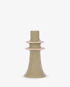 Green stoneware candlestick shown from the side
