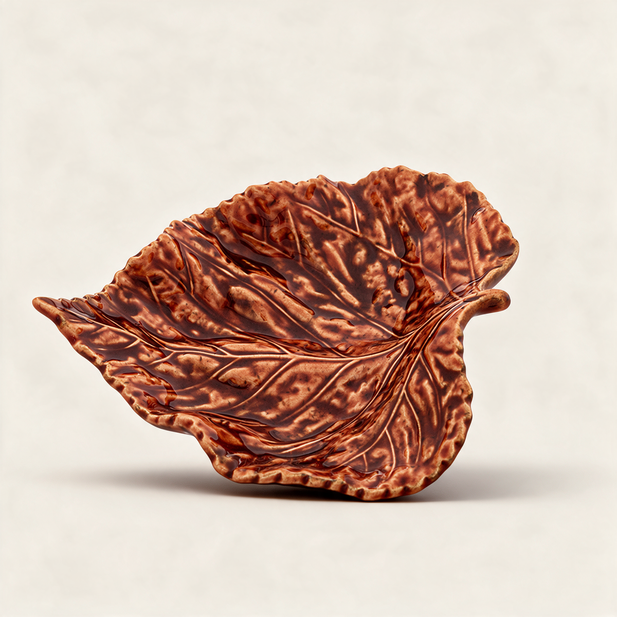 Small orange hand-painted earthenware birch leaf serving dish from the Gudrun collection