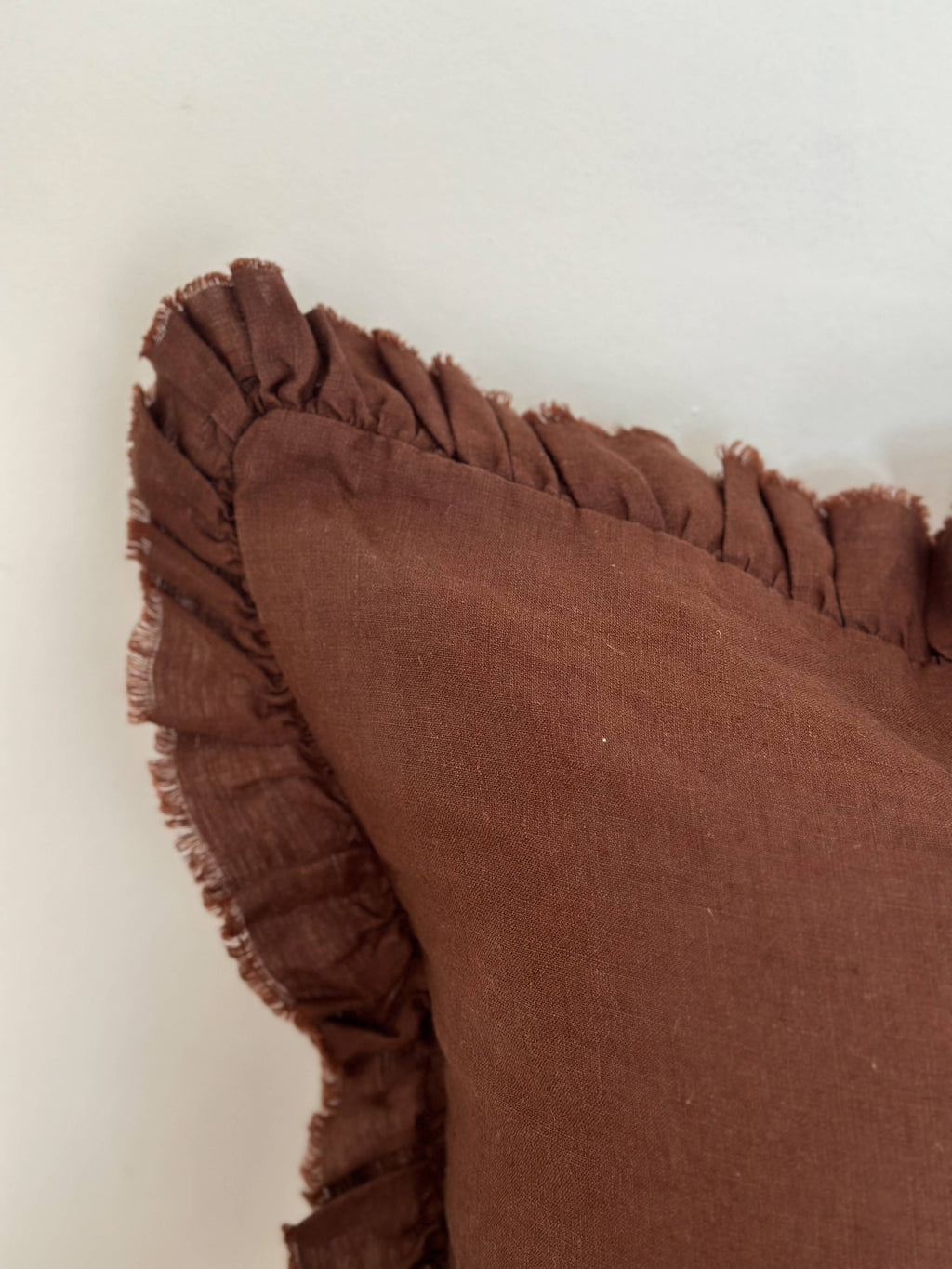 Hallie ruffled linen cushion cover in dark brown, supplier detail photo