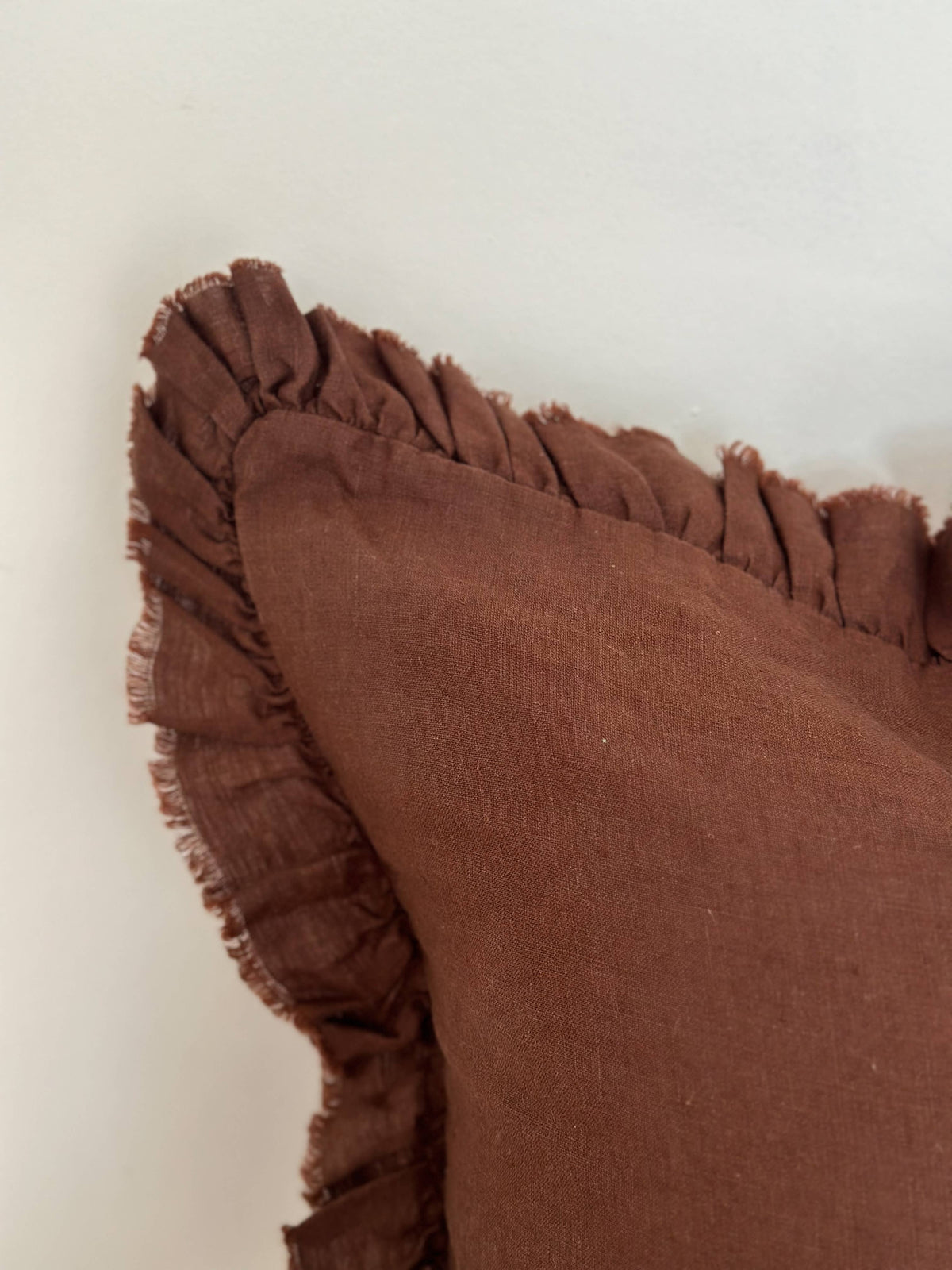 Hallie ruffled linen cushion cover in dark brown, supplier detail photo
