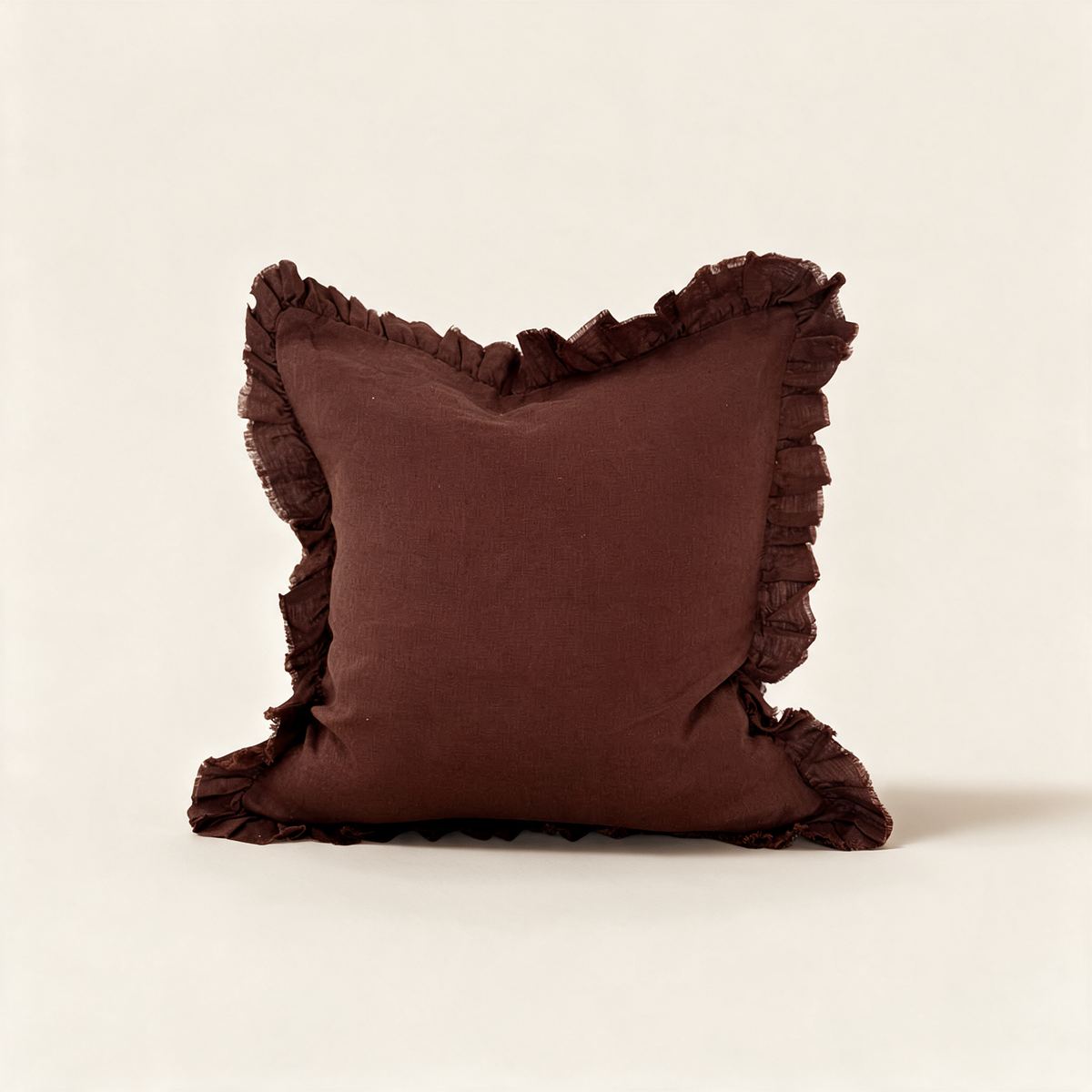 Hallie ruffled stonewashed linen cushion cover in dark brown